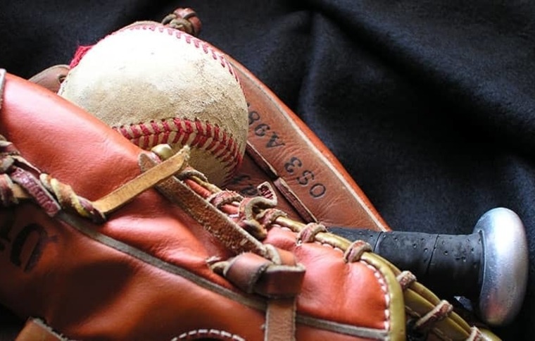 glove, ball, and bat from BW baseball camp